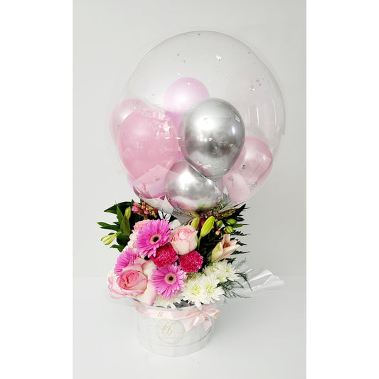 Unique balloon arrangements made with a clear Bubble balloon and designed to match your event in every way possible. Every arrangement is customized.