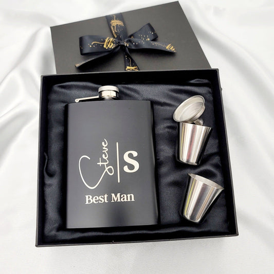 Engraved Matte Black Stainless Steel Hip Flask Set, perfect for groomsmen, best men, or any whiskey enthusiast. Crafted from high-quality, anti-rust stainless steel with an 8oz capacity, this sleek flask is designed for both style and durability. The laser engraving reveals the natural stainless steel color, creating a classic and timeless look.