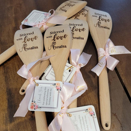 Natural wooden spoons, personalized for any occasion. Perfect for wedding favors, birthday gifts, or bulk orders. Custom engravings add a rustic charm.