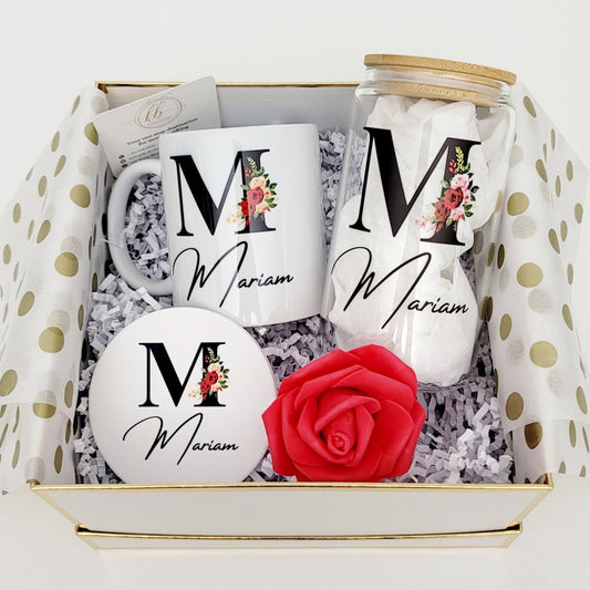 Bring the beauty of blooming flowers to your everyday with our "Bloom & Sip Set." This elegant trio features a custom mug showcasing a floral letter, a stylish glass, and a matching coaster, creating a perfectly coordinated set for all your favorite beverages. Personalize it with your initial or a loved one's for a unique touch