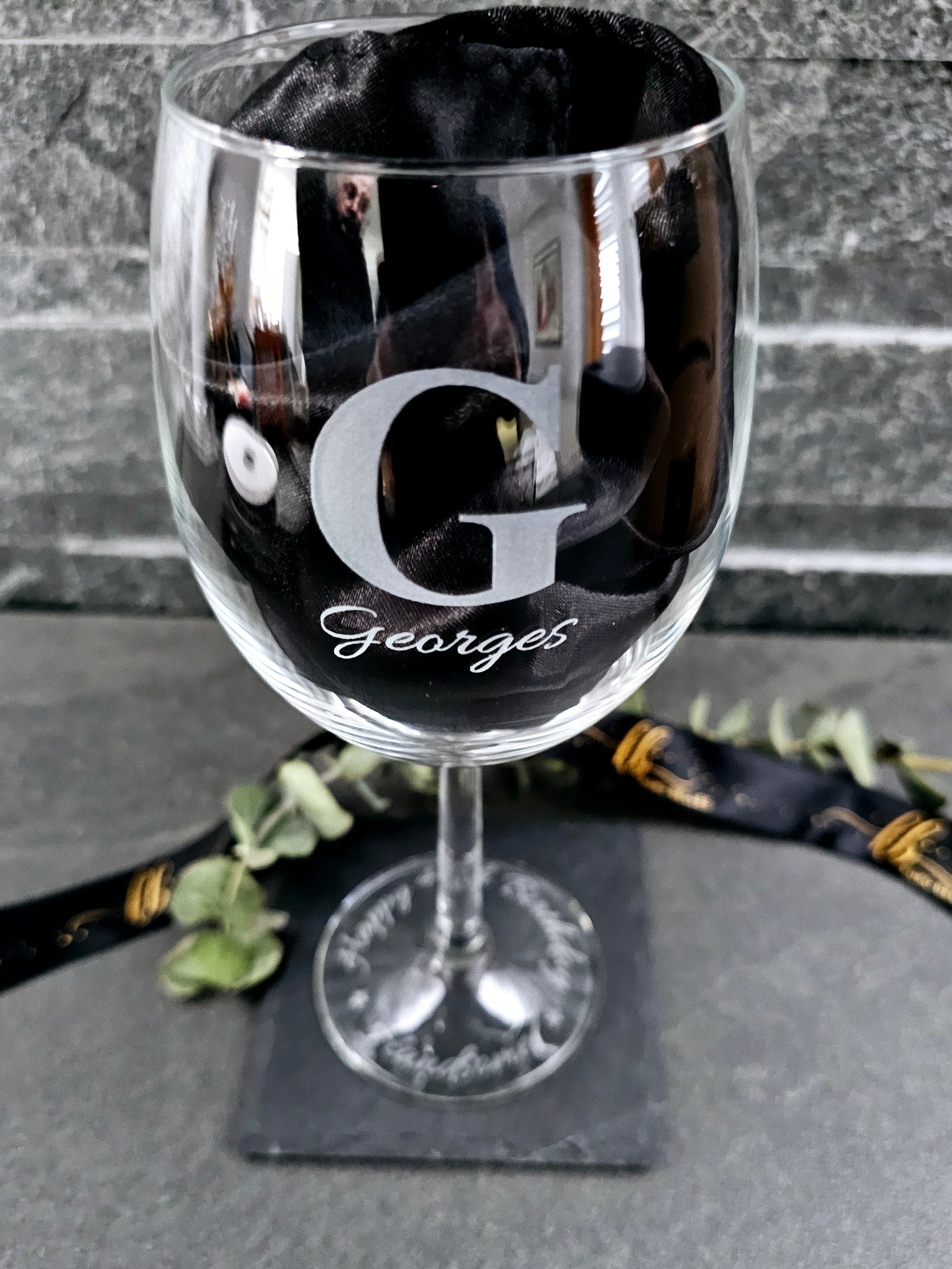 Dual-engraved wine glasses: Name on the bowl, message on the base. Personalize yours today!