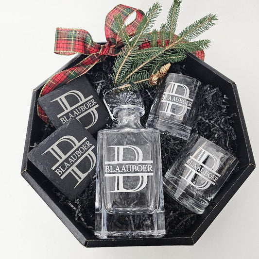 Gift set includes a whiskey decanter with two whiskey glasses and two slate coasters