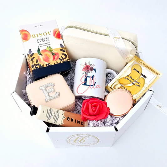 Glamorous gift box for her with personalized mug makeup bag jewelry case. Sparkling gift set for Mother's Day teacher appreciation and anniversaries. Dazzling gift box with custom mug travel mirror and under eye mask. Luxurious gift for engagements birthdays housewarmings and retirements.
Personalized glam gift set with makeup pouch travel jewelry organizer.