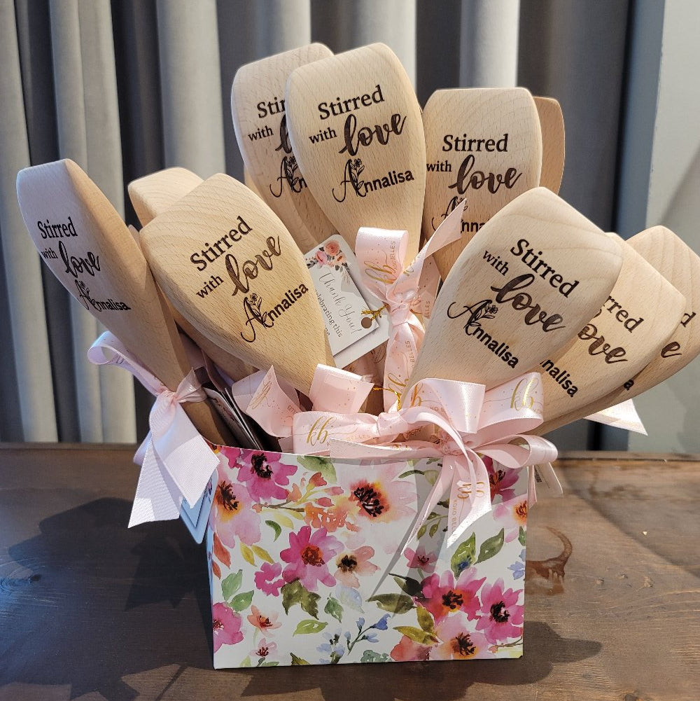 Bulk personalized wooden spoons for weddings, birthdays, and corporate events. Custom engraving available. Durable & charming gifts. Order your bulk set today.
