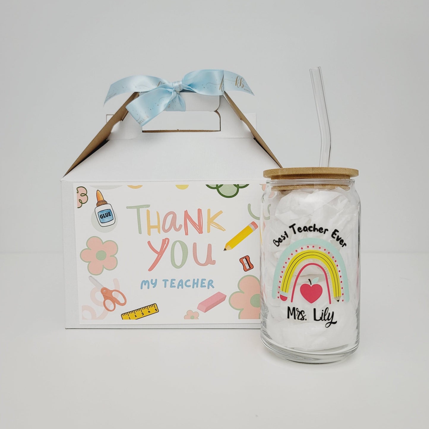 Give the gift of style and function with our Back To School Teacher Drinking Glass. The vibrant rainbow print makes this sleek drinking glass a unique and practical essential for any teacher as they start the new school year. Help them stay refreshed and ready to tackle the exciting challenges ahead with a glass that looks great from every angle.