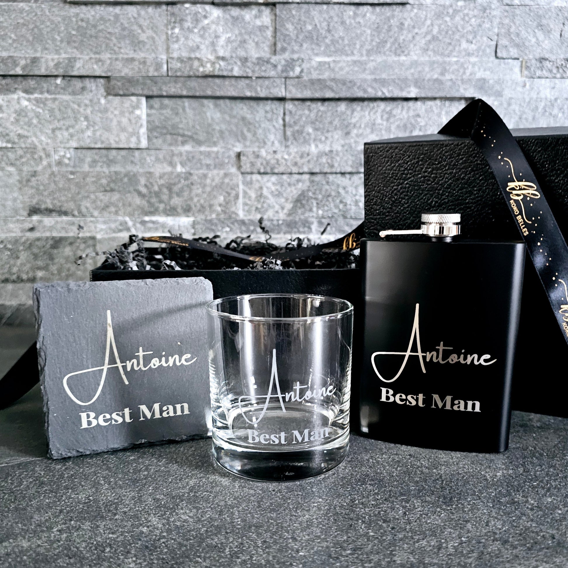 The perfect trio for your groomsmen proposal! This personalized set includes an engraved whiskey glass, stainless steel hip flask, and slate coaster.