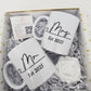 Two white mugs with 'Mr.' and 'Mrs.' text in a white with gold trim box