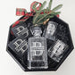 Gift set includes a whiskey decanter with two whiskey glasses and two slate coasters