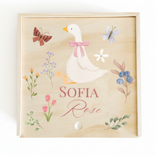 Wooden box with a goose illustration and 'Sofia Rose' text on a light background