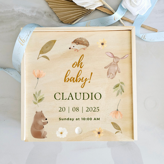 Personalized wooden baby memory box with watercolor bear, bunny, and hedgehog among wildflowers.