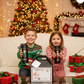 Boy and Girl with Personalized Christmas Water Bottles