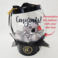 Transparent balloon with a koala toy inside, featuring the word 'Congrats!' and customizable text option.